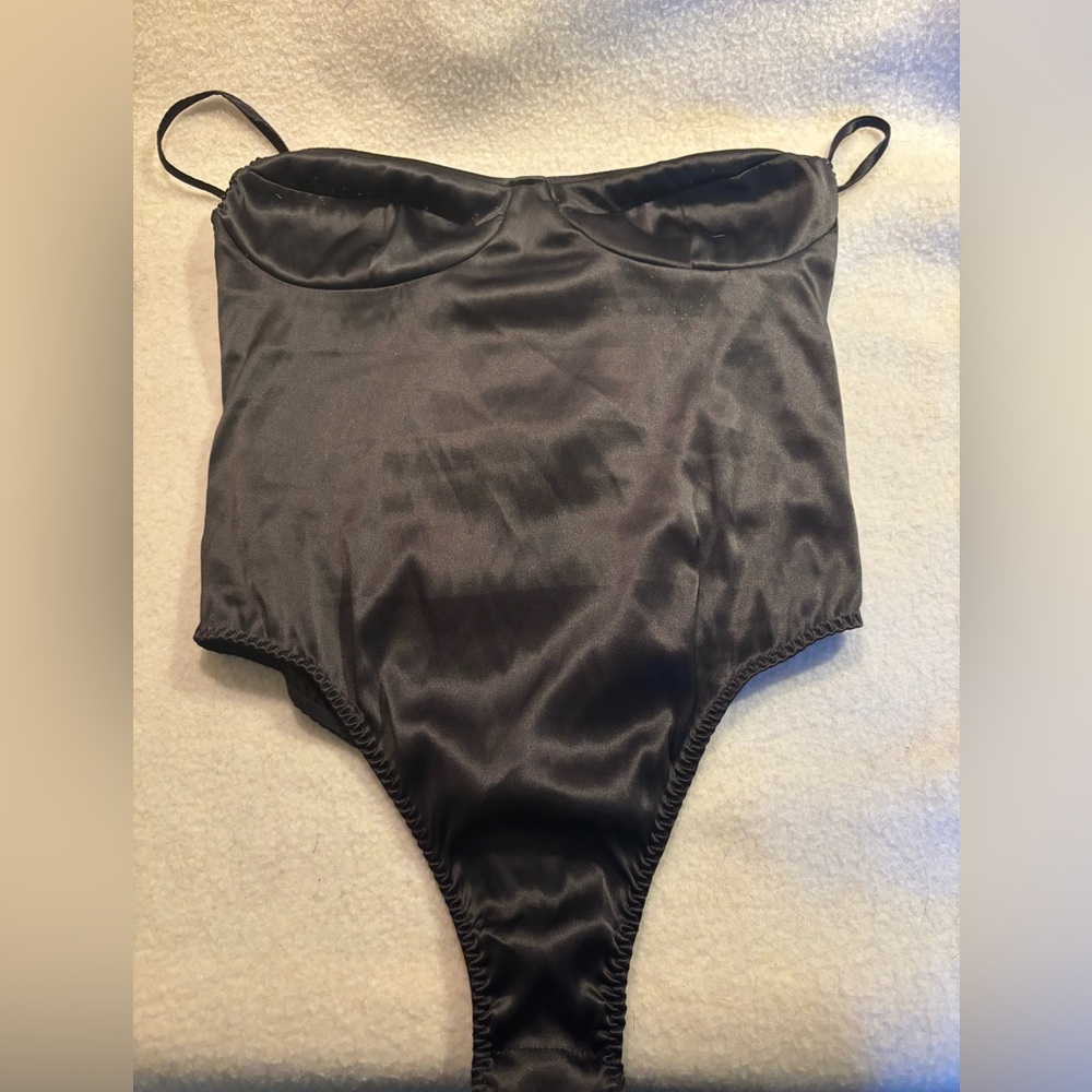 Victoria’s Secret bodysuit, size small.